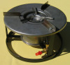 12 Drop The Ignitor Plate Onto The Center To Complete The Stove